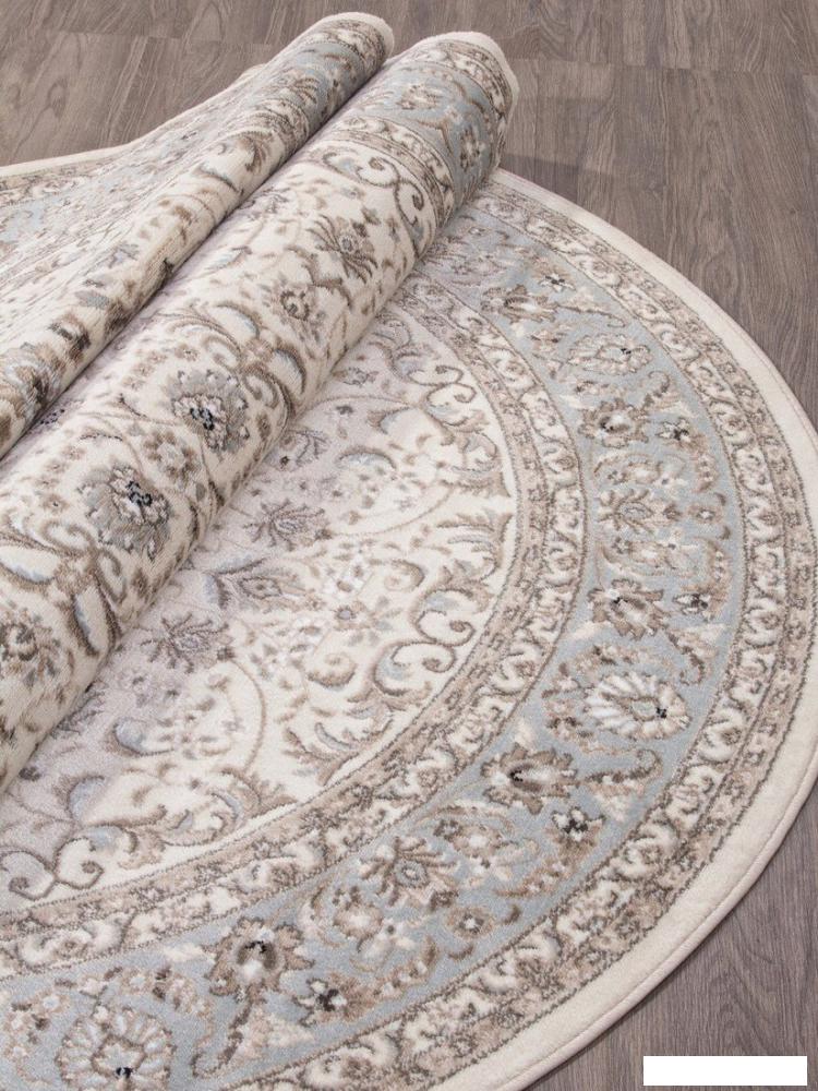 Ковер для жилой комнаты Merinos Valencia Deluxe F014-OVAL-CREAM-L.BLUE (1.5х2.3)