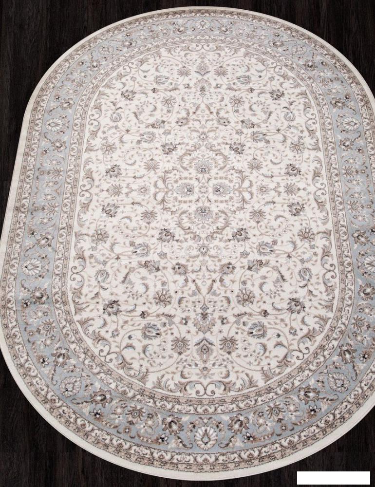 Ковер для жилой комнаты Merinos Valencia Deluxe F014-OVAL-CREAM-L.BLUE (1.5х2.3)